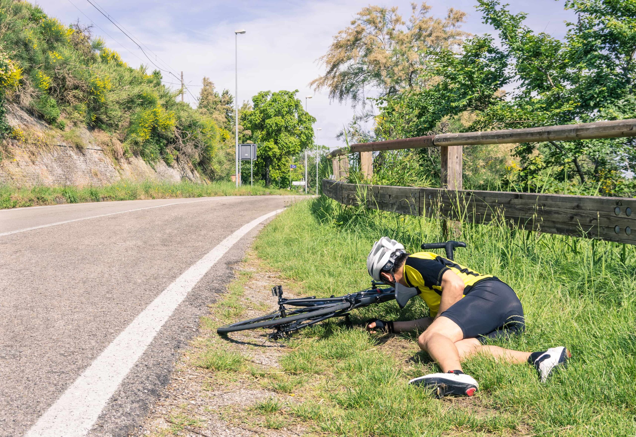bicycle accident on the side of the road